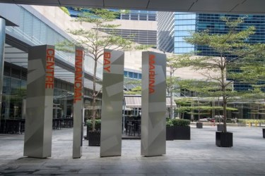 Marina Bay Financial Centre in Singapore, home to King & Wood's newly launched Singapore office.